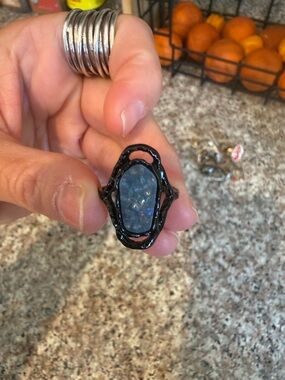 Black Ring with Iridescent Blue Opal Stone